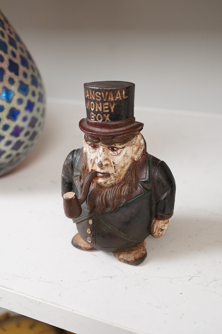 A ‘Transvaal’ cast iron money box, 15cm